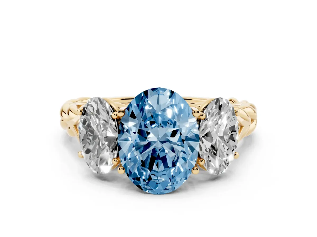 Fancy Blue Three-Stone Oval Cut Diamond Braided Band Ring with Four-Prong Setting Yellow gold
