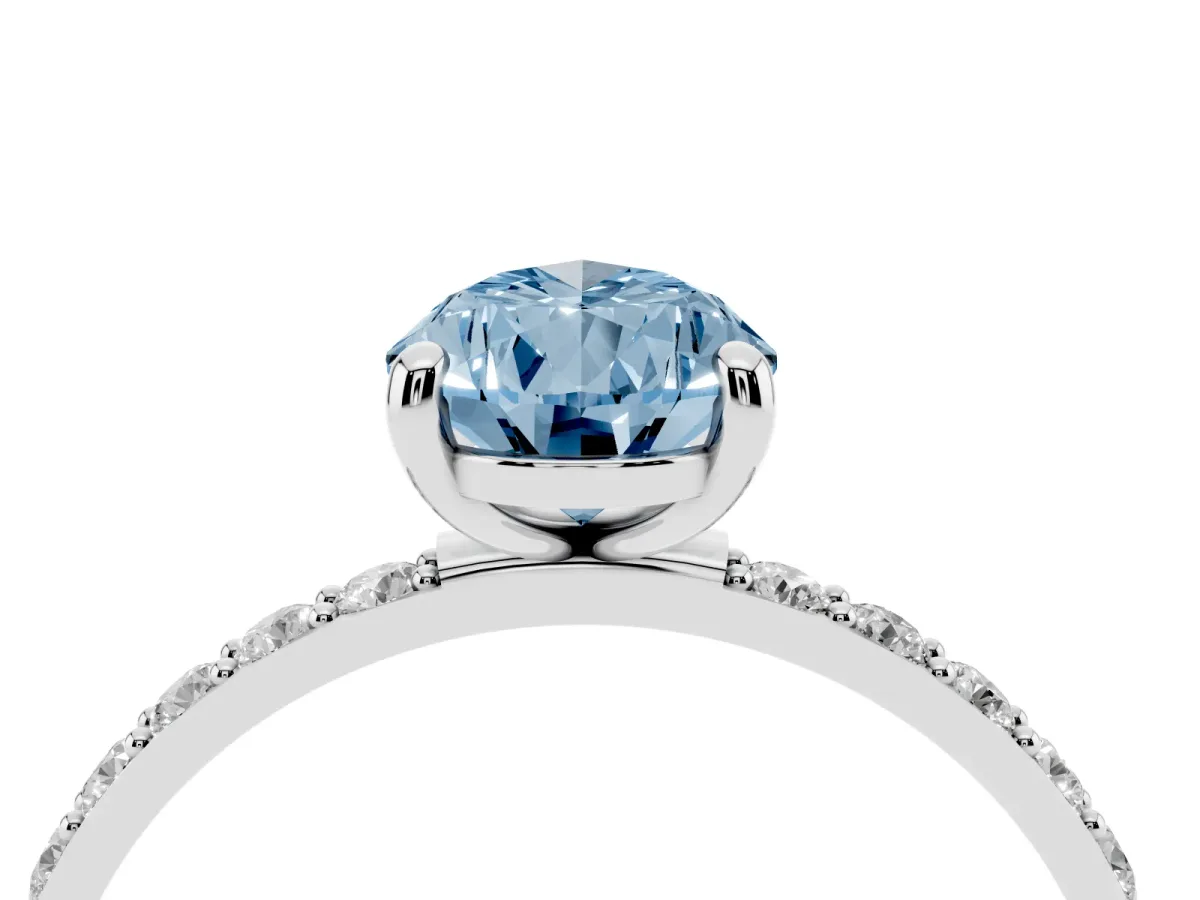 Fancy Blue Pear Cut Diamond Solitaire Ring with Round Pavé Band and Prong Setting Platinum