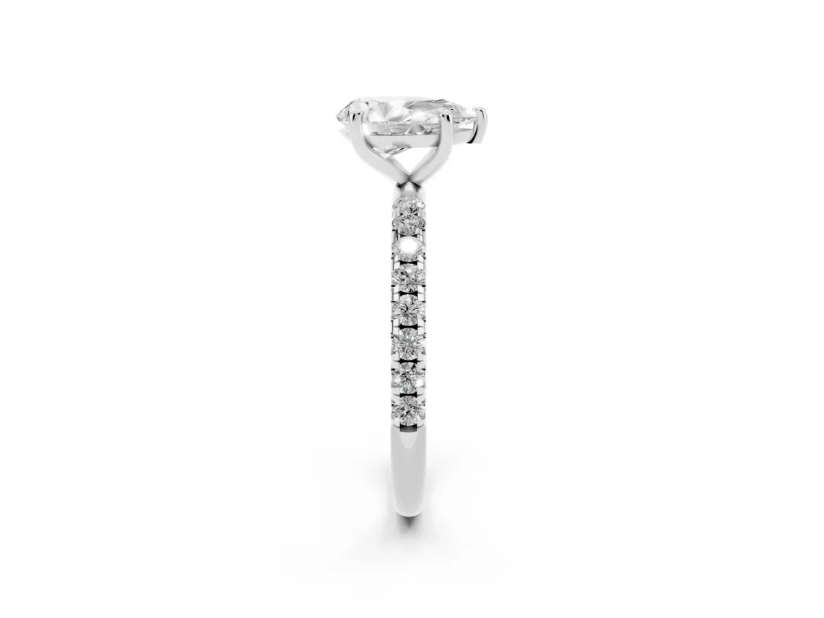 Pear Cut Cut Diamond Solitaire Ring with Micro Pave Band and Four Prong Setting Silver
