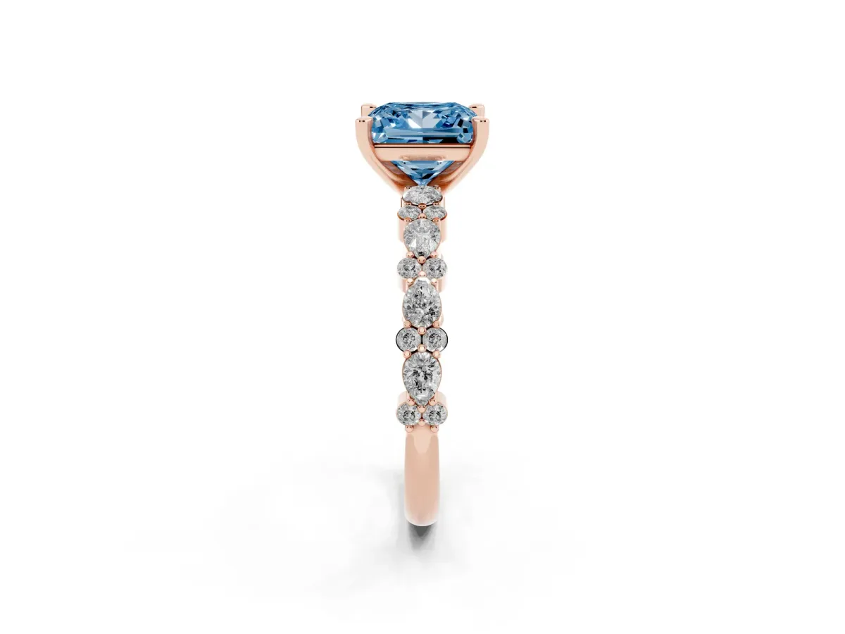 Fancy Blue Princess Cut Diamond Side Stone Solitaire Ring with Round and Four-Prong Setting Rose gold