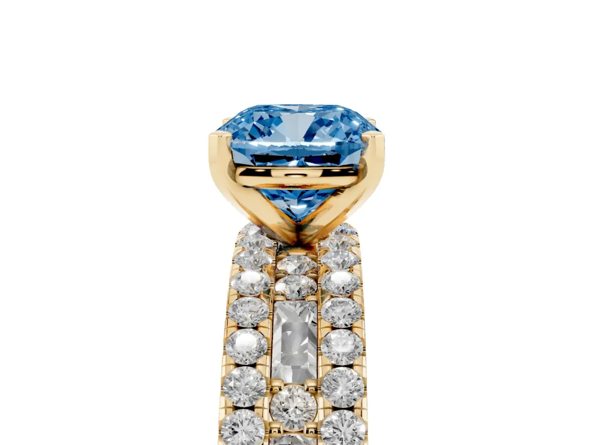 Fancy Blue Cushion Cut Diamond Solitaire Ring with Pavé and Channel Set Band Yellow gold