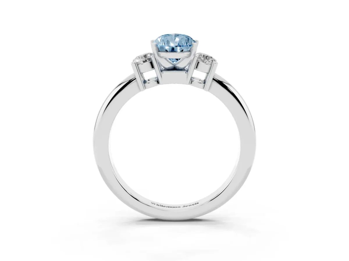 Fancy Blue Three-Stone Pear Cut Cut Diamond Solitaire with Prong Setting and Classic Band Silver
