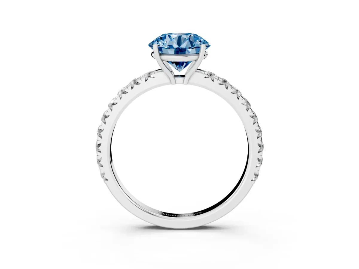 Fancy Blue Round Cut Diamond Pavé Solitaire Engagement Ring with Four-Prong Setting Silver