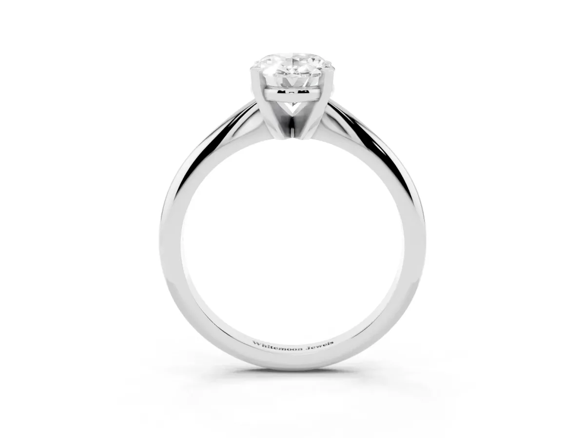 Oval Cut Cut Solitaire Ring with Four-Prong Setting on a Classic Band Platinum