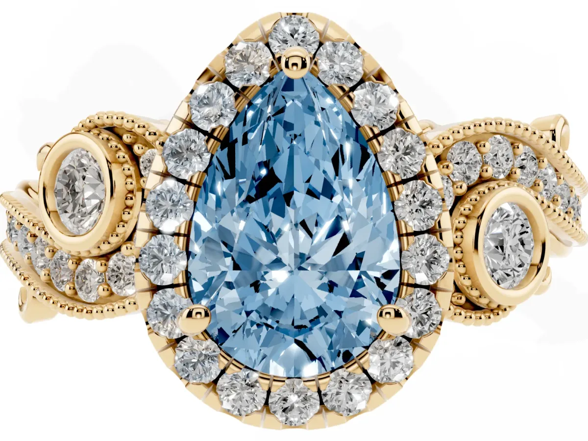 Fancy Blue Pear Cut Diamond Halo Ring with Milgrain Pavé Band and Four-Prong Setting Yellow gold