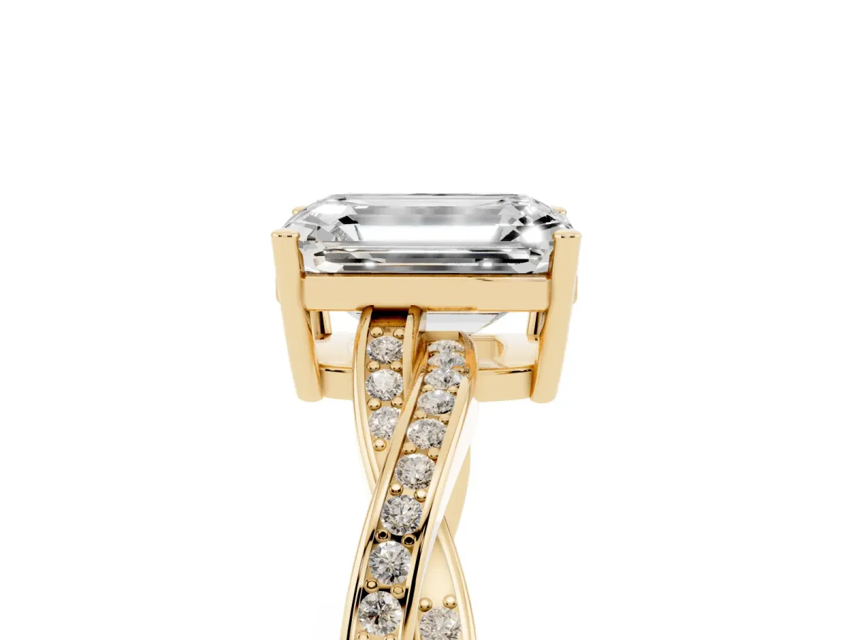 Emerald Cut Solitaire Twisted Pave Diamond Ring with Four-Prong Setting Yellow gold