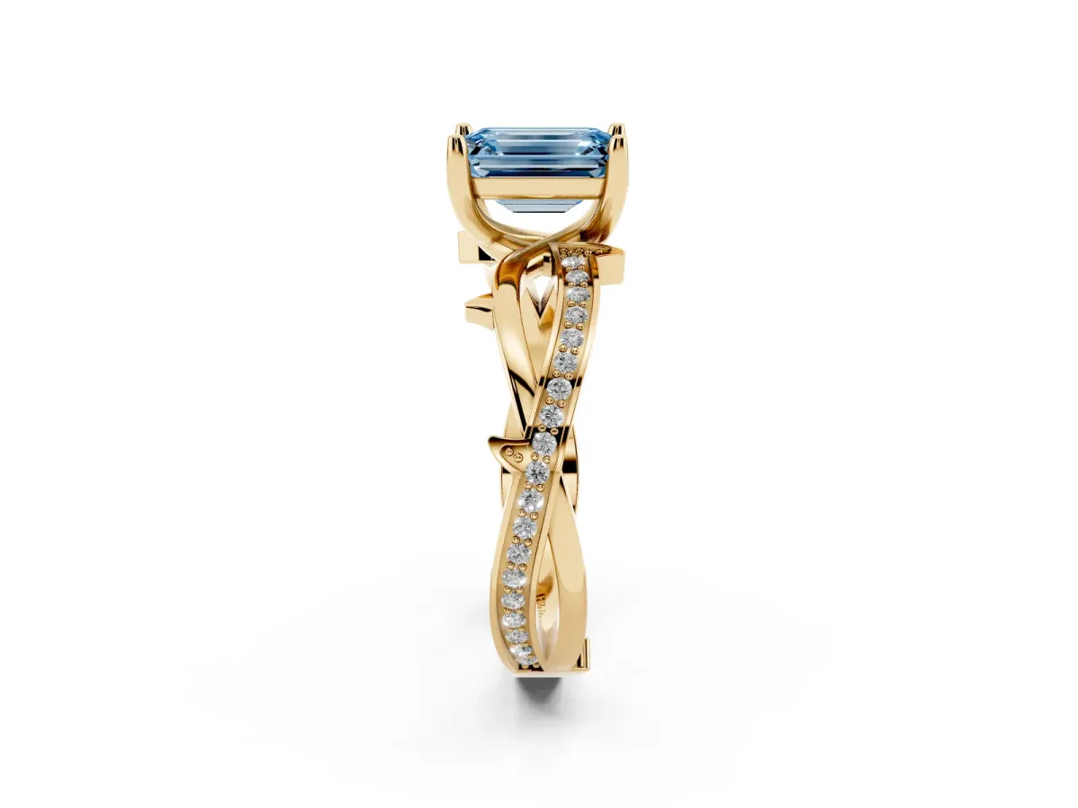 Fancy Blue Emerald Cut Solitaire Twist Band with Pavé Accents and Four-Prong Setting Yellow gold