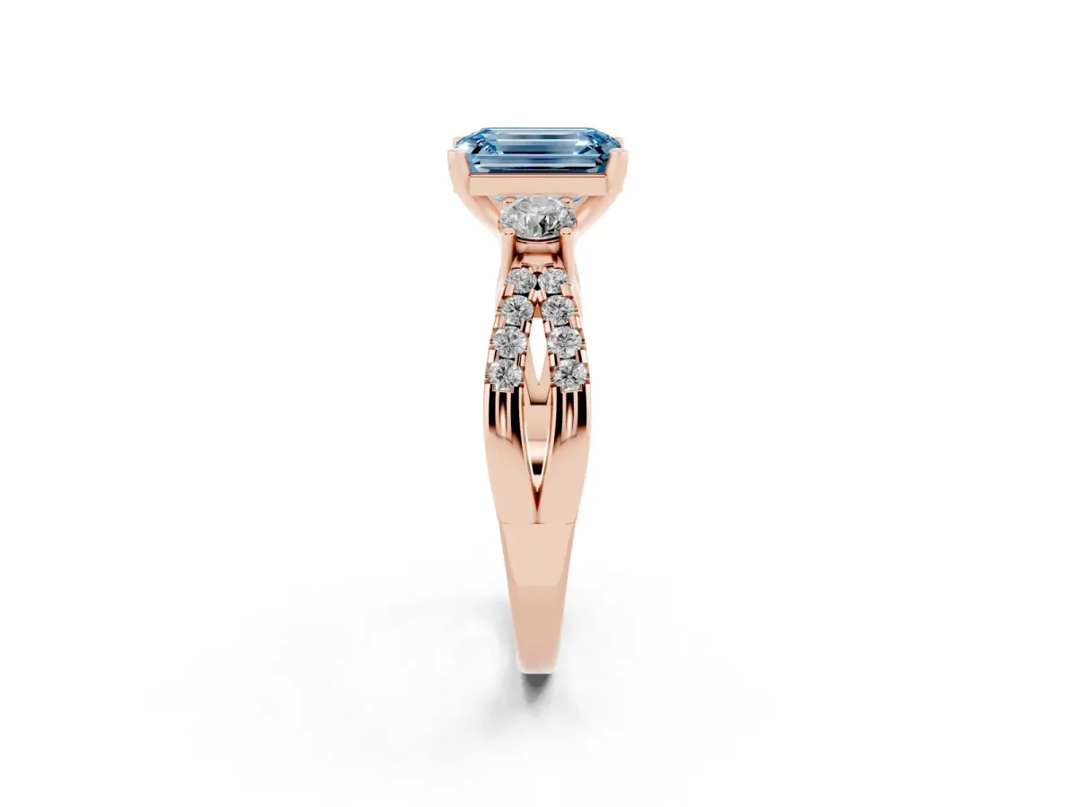 Fancy Blue Emerald Cut Diamond Three-Stone Ring with Pavé Split Shank and Four-Prong Setting Rose gold