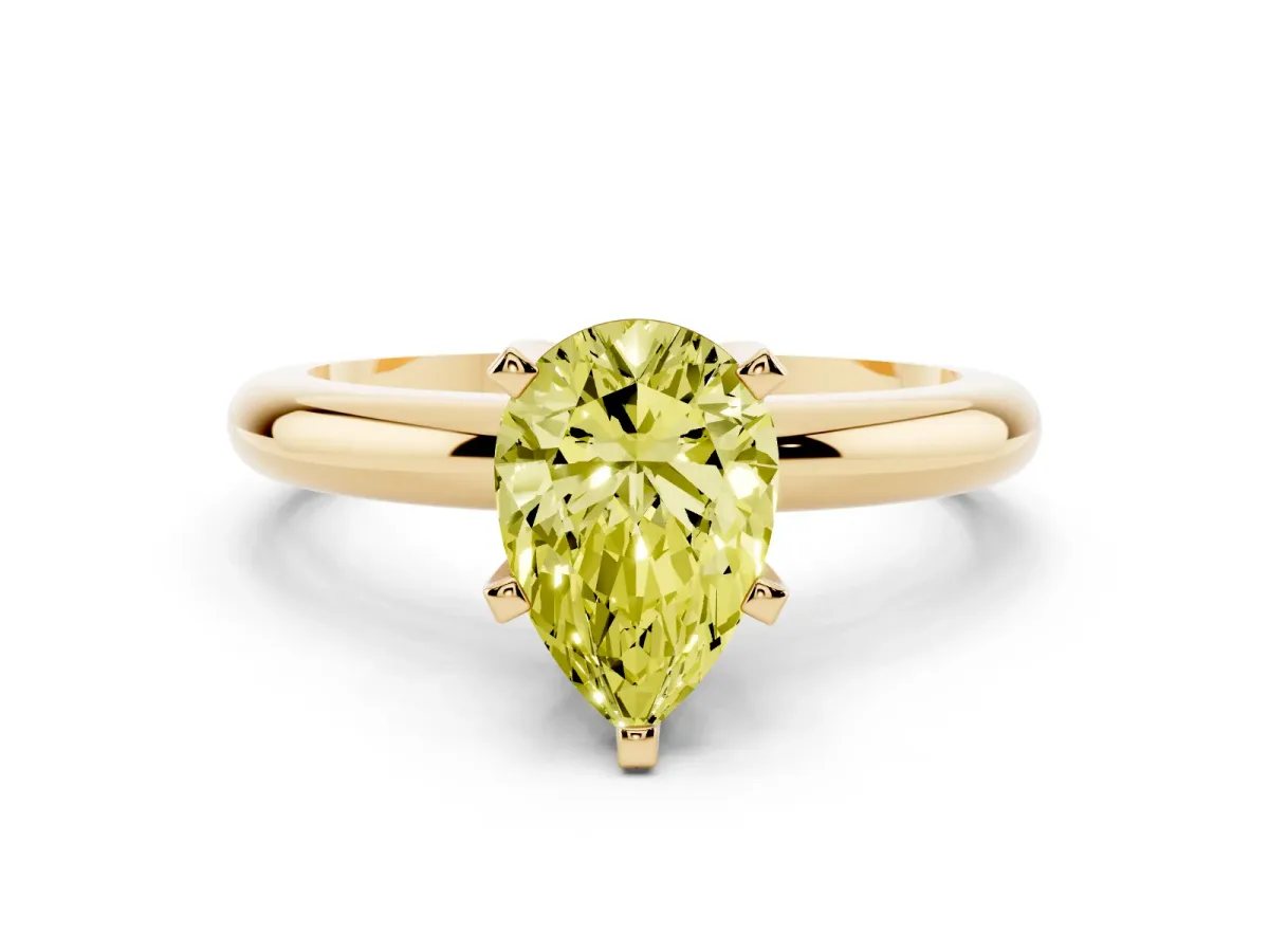 Fancy Yellow Pear Cut Diamond Solitaire Engagement Ring with Round Band and Four-Prong Setting Yellow gold