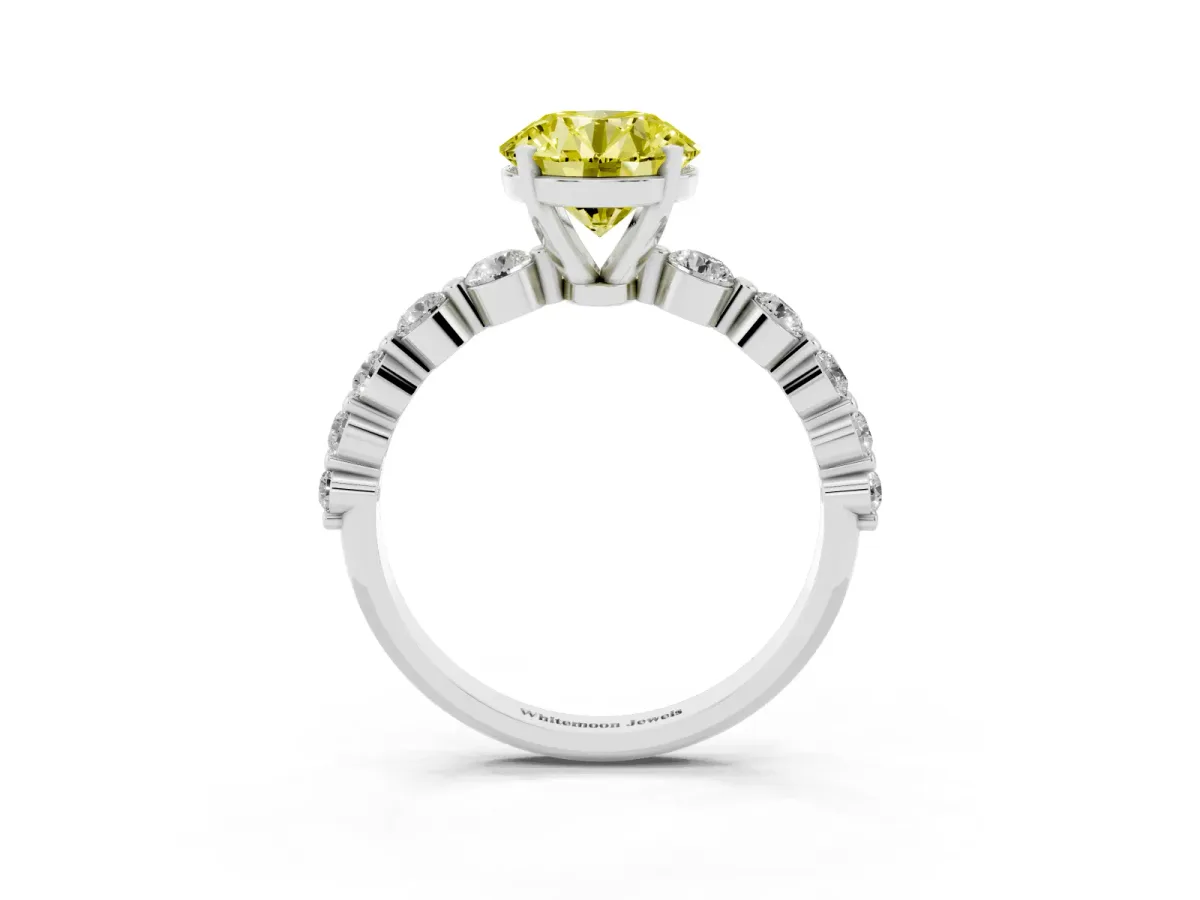 Fancy Yellow Round Cut Solitaire Diamond Ring with Pave Band and Four-Prong Setting Silver