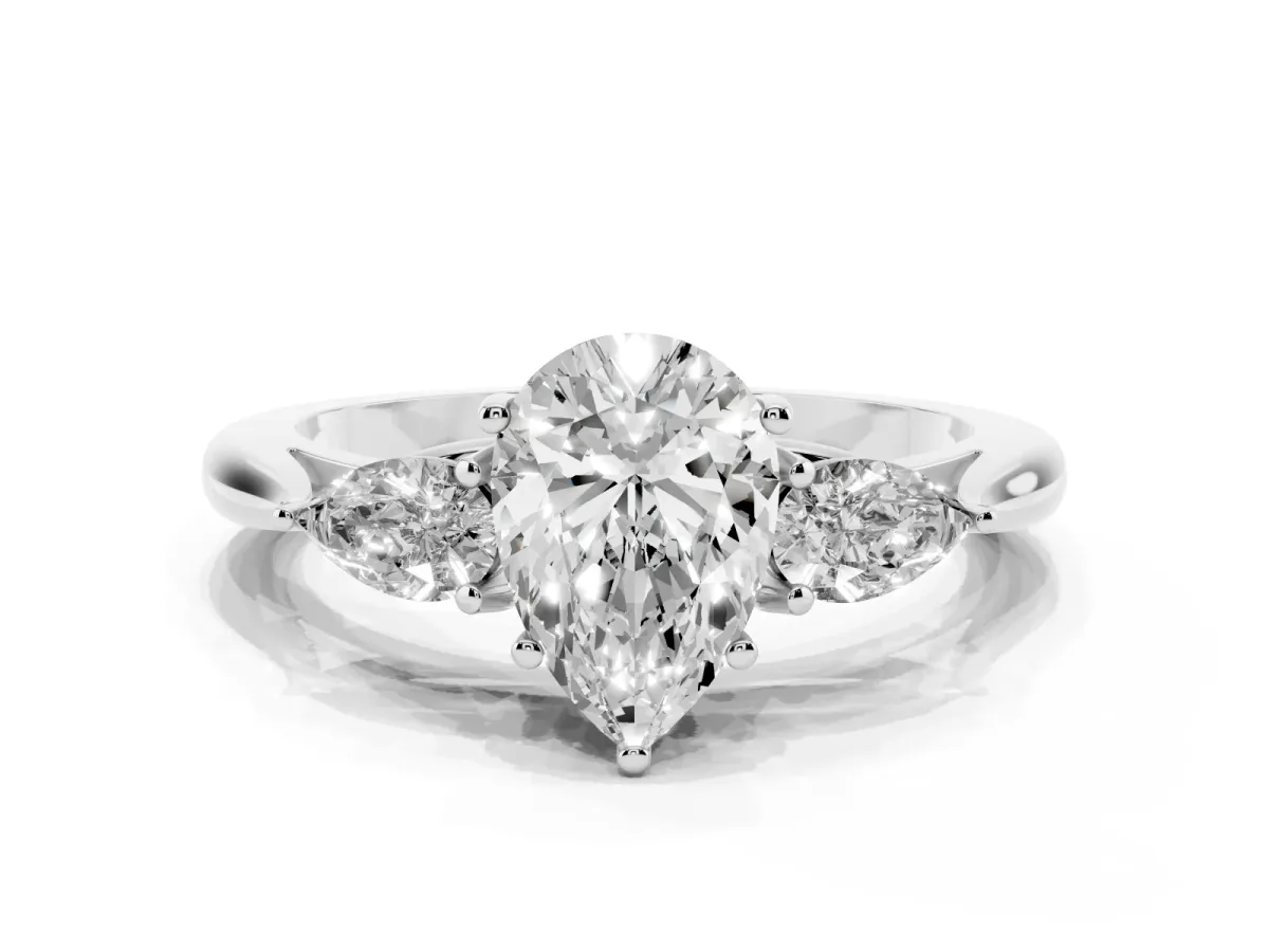 Three-Stone Pear Cut Brilliant Diamond Solitaire Ring with Tapered Band and Four-Prong Setting Platinum
