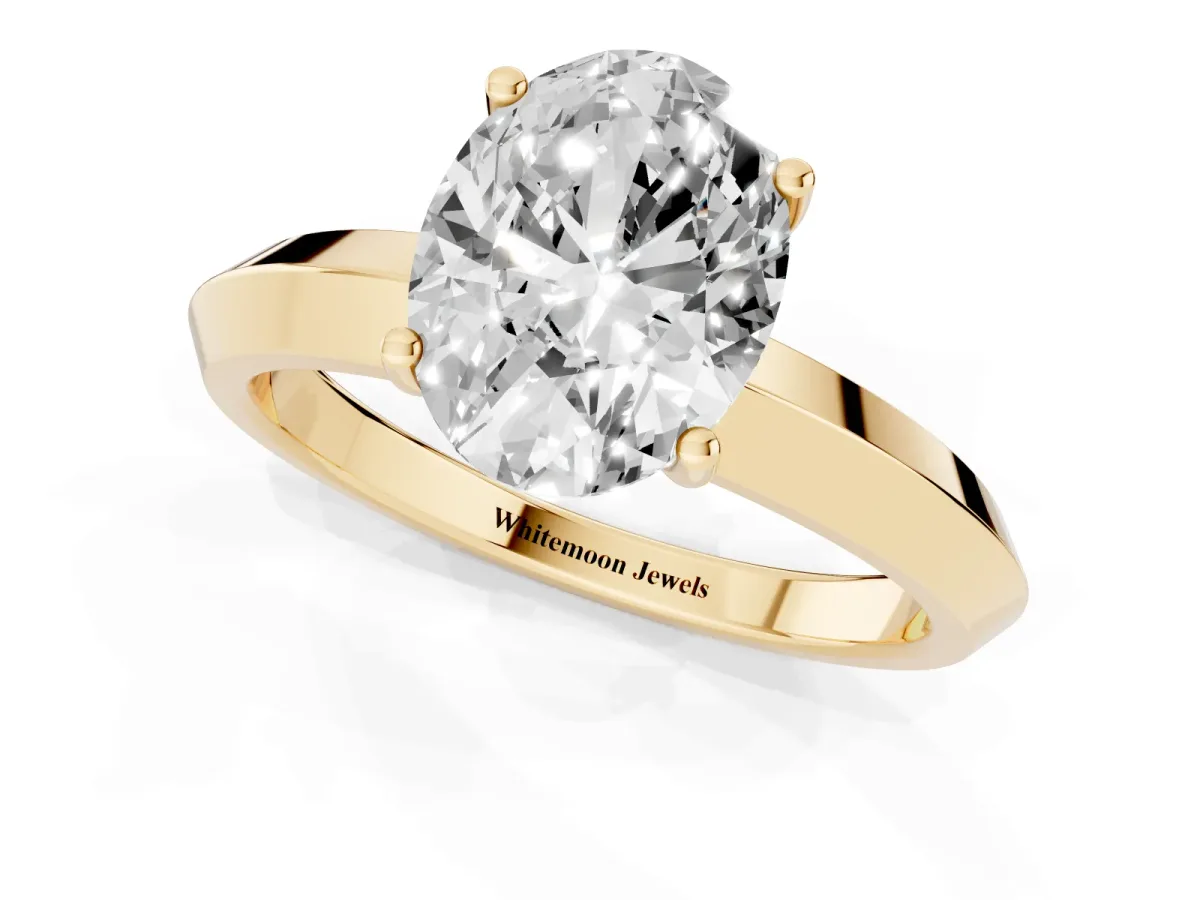 Oval Cut Cut Solitaire Engagement Ring with Flat Band and Four-Prong Setting Yellow gold