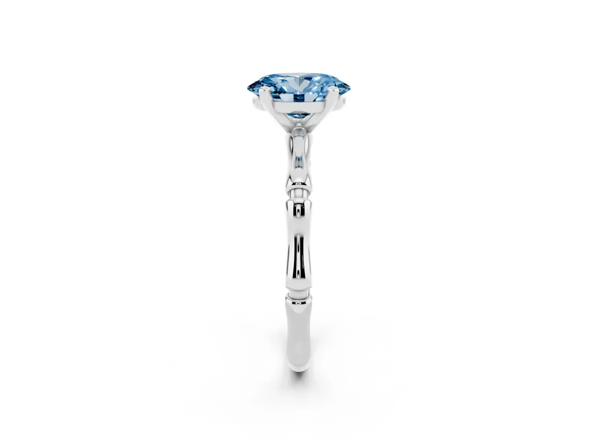 Fancy Blue Oval Cut Solitaire Diamond Ring with Bamboo Band and Four-Prong Setting Silver