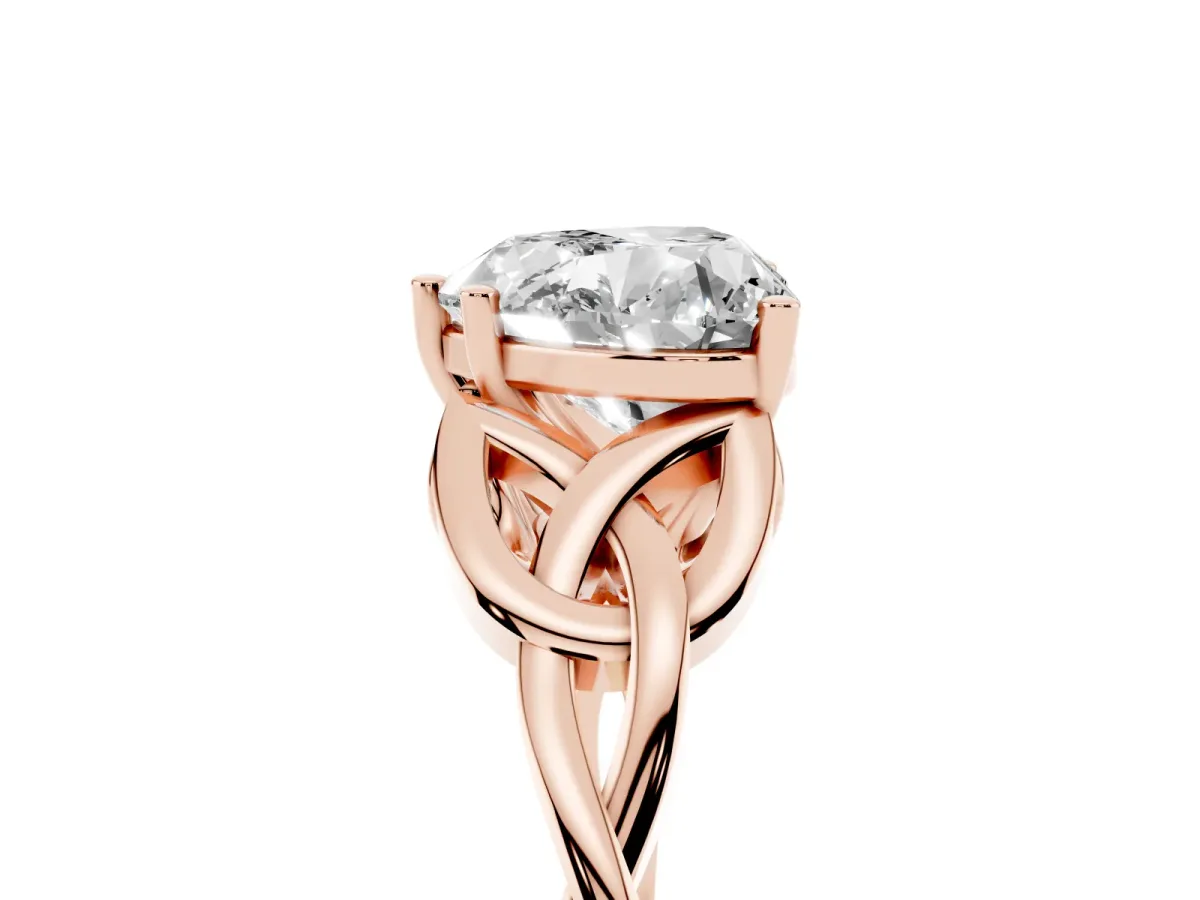 Heart Cut Diamond Solitaire Engagement Ring with Celtic Knot Band and Four-Prong Setting Rose gold
