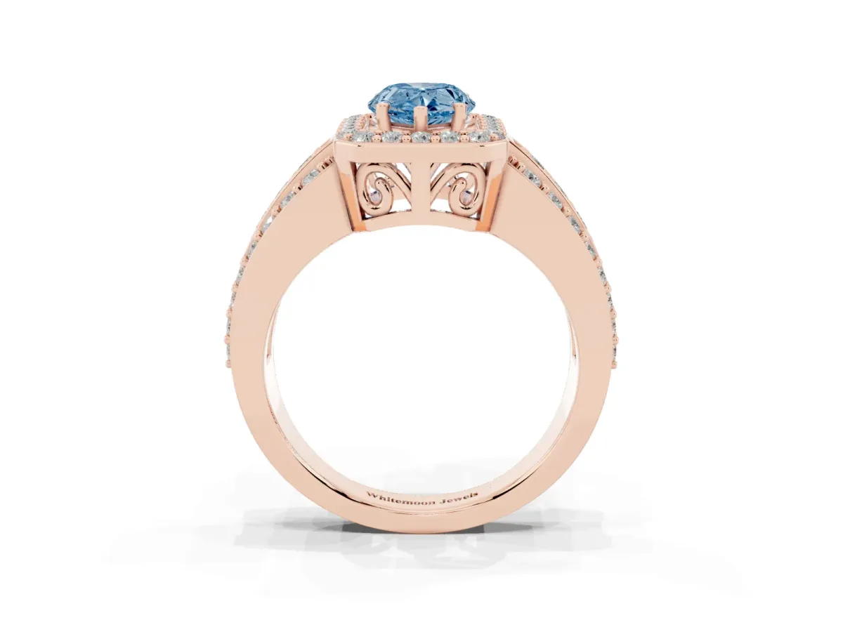 Fancy Blue Pear Cut Halo Diamond Ring with Round Split Shank and Prong Setting Rose gold
