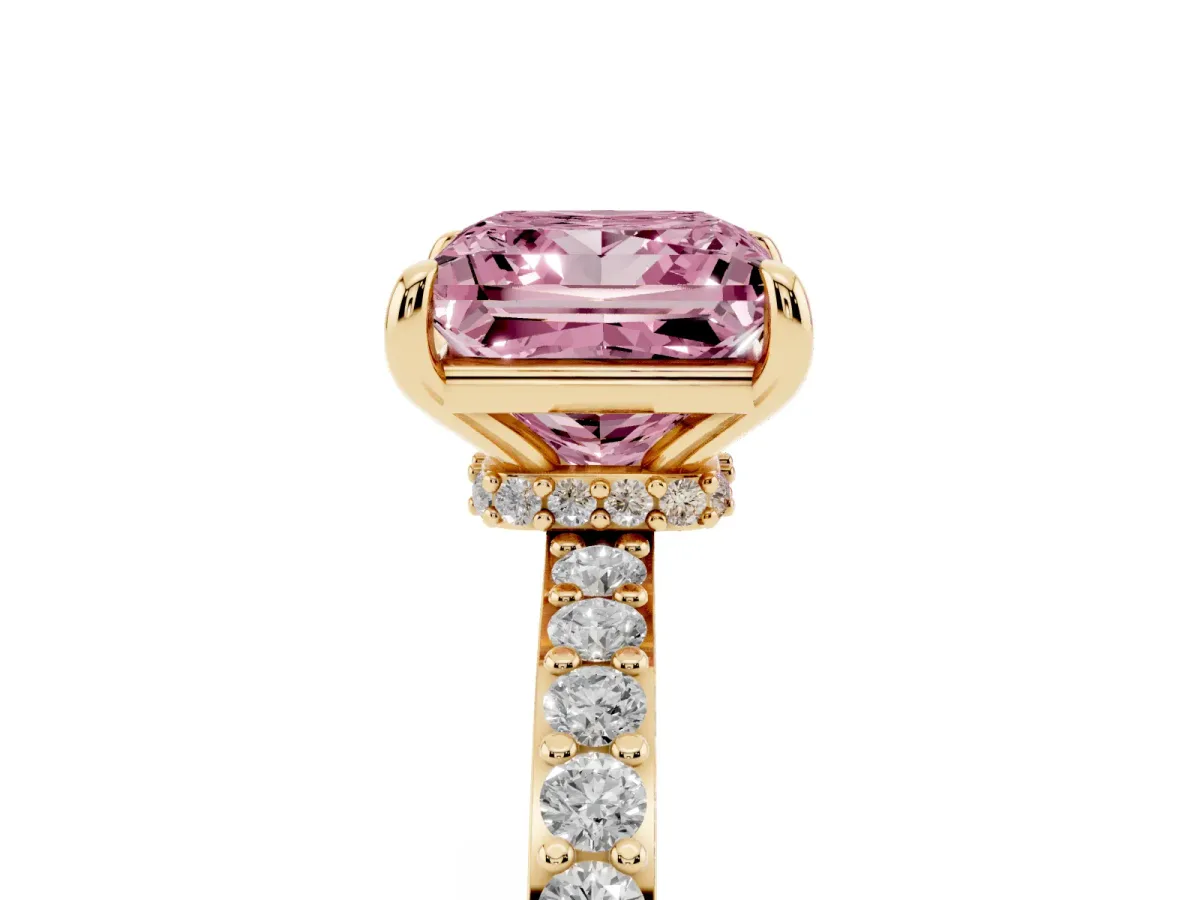 Fancy Pink Princess Cut Diamond Solitaire Engagement Ring with Pavé Band and Four-Prong Setting Yellow gold