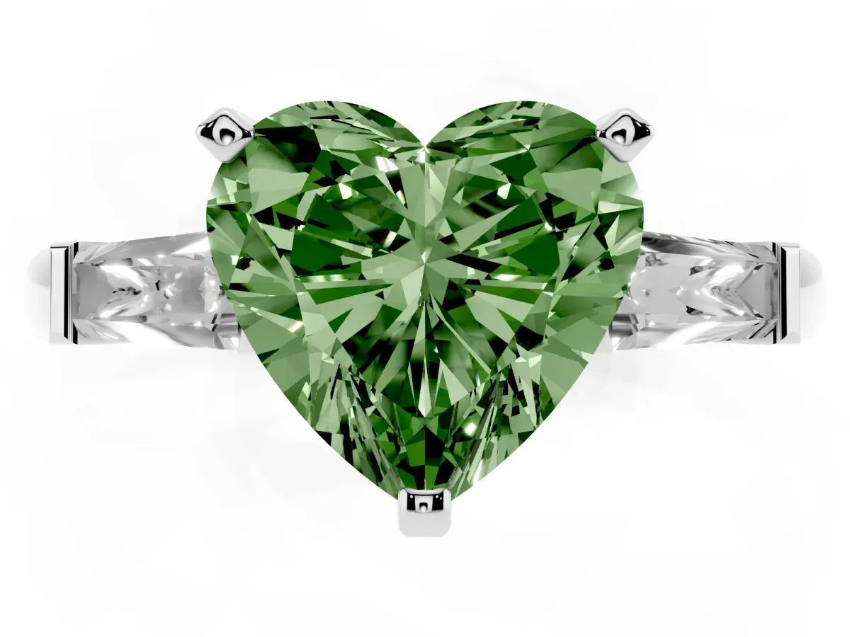 Fancy Green Heart Cut Solitaire with Tapered Baguette Side Stones on a Classic Band with Four-Prong Setting Silver