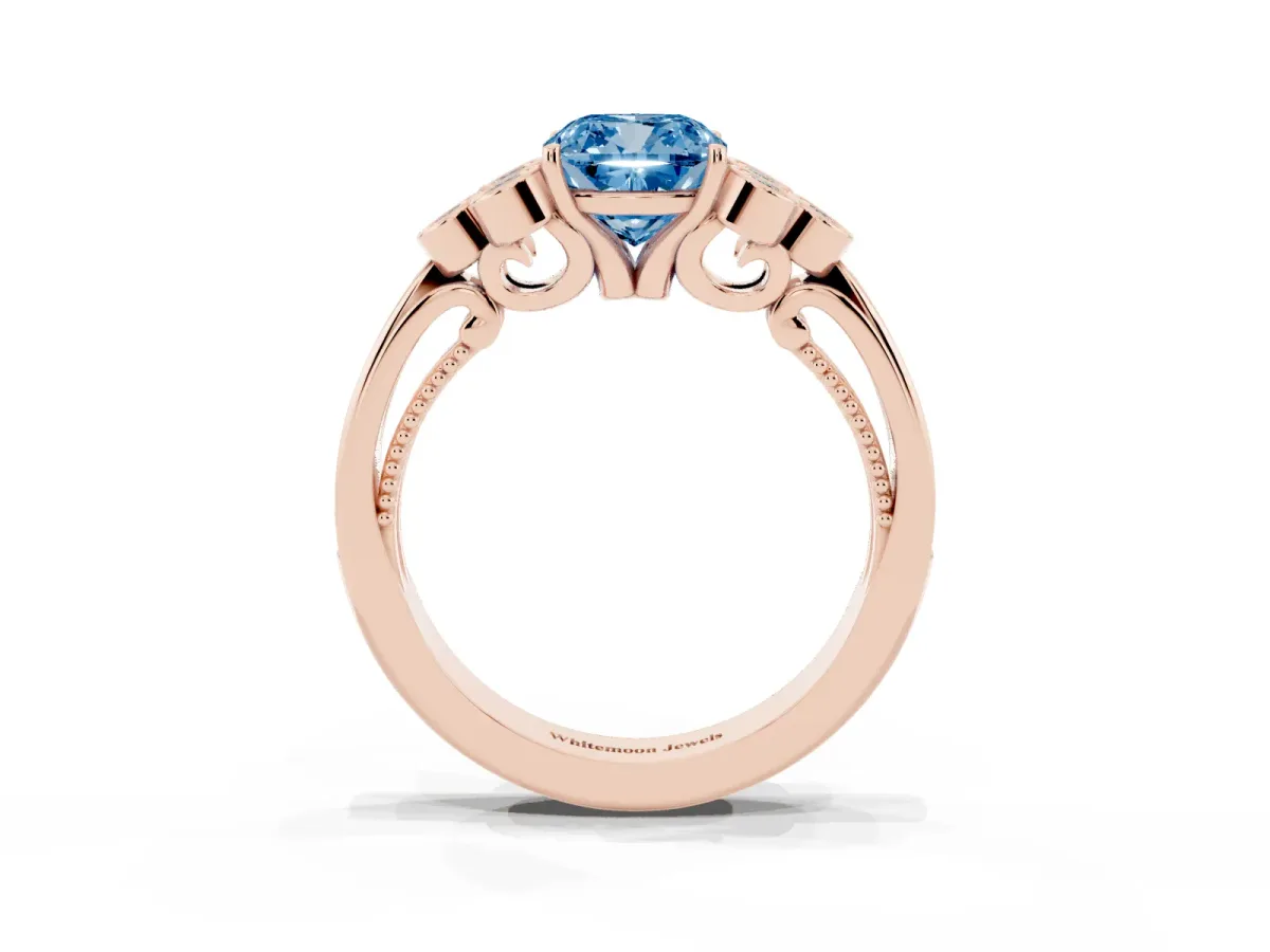 Fancy Blue Cushion Cut Cut Diamond Engagement Ring with Bezel Set Round Side Stones and Prong Setting Rose gold