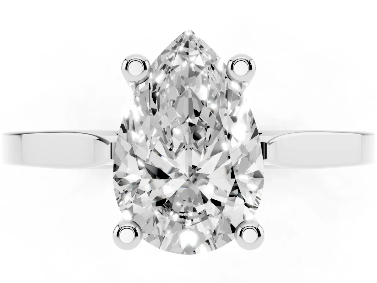 Pear Cut Solitaire Diamond Ring with Four-Prong Setting and Tapered Band Platinum