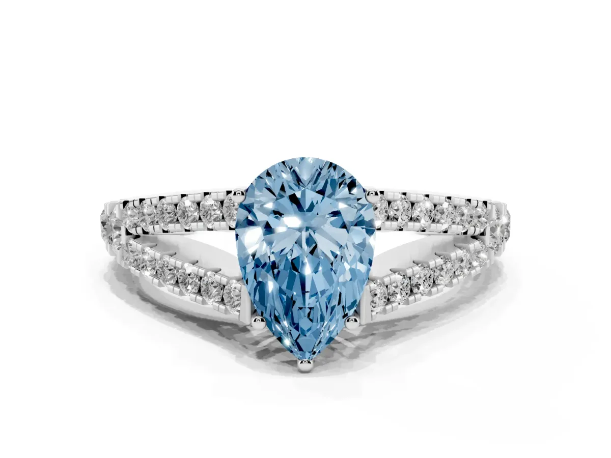 Fancy Blue Pear Cut Diamond Split Shank Engagement Ring with Round Pavé and Prong Setting Platinum