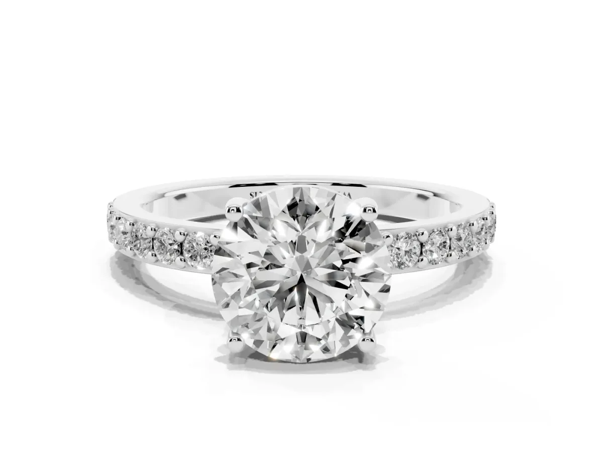 Round Cut Cut Diamond Solitaire with Pave Band and Four-Prong Setting Silver