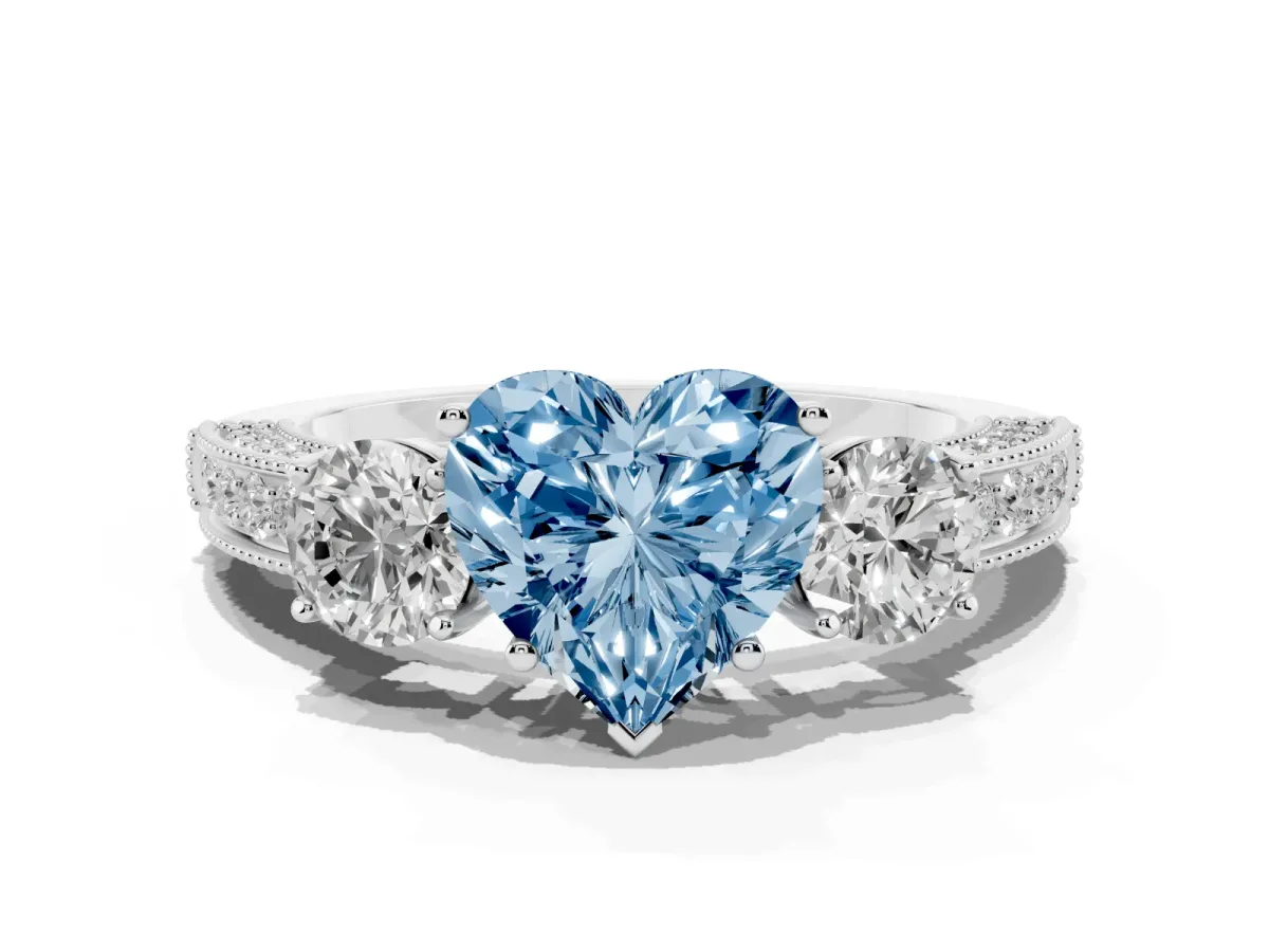Fancy Blue Heart Cut Three-Stone Diamond Ring with Pavé Band and Four-Prong Setting Silver