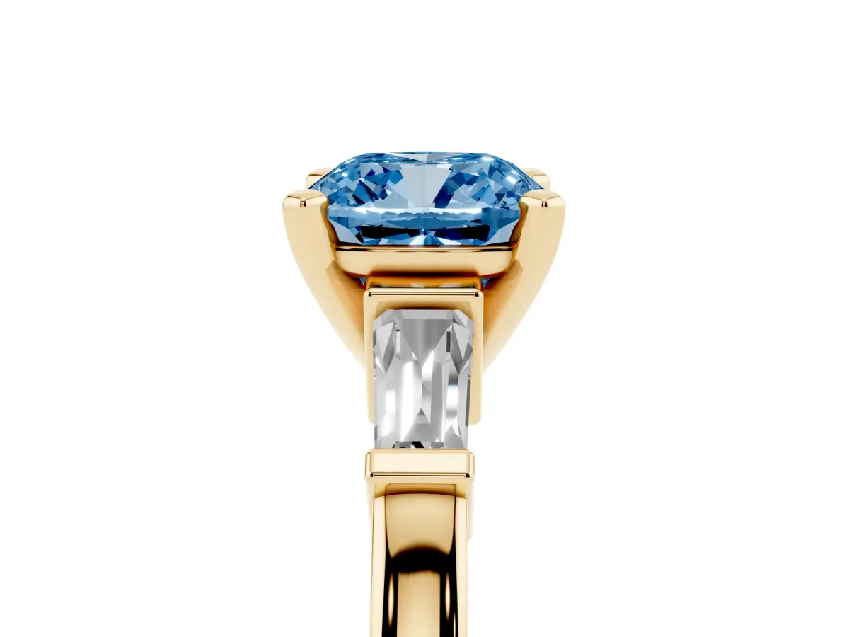 Fancy Blue Cushion Cut Cut Diamond Solitaire Ring with Tapered Baguette Accents and Four-Prong Setting Yellow gold