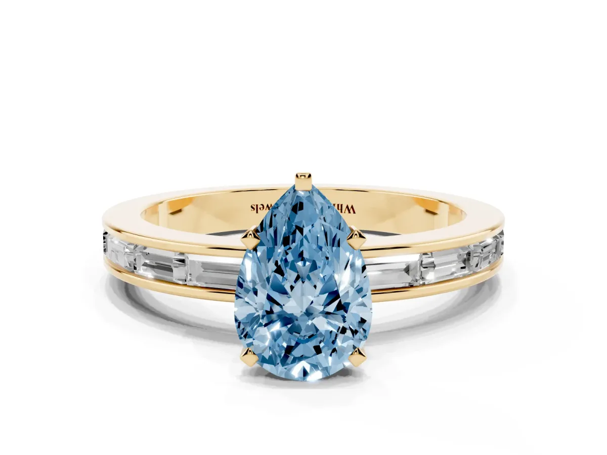 Fancy Blue Pear Cut Solitaire Diamond Ring with Channel-Set Baguette Band and Four-Prong Setting Yellow gold