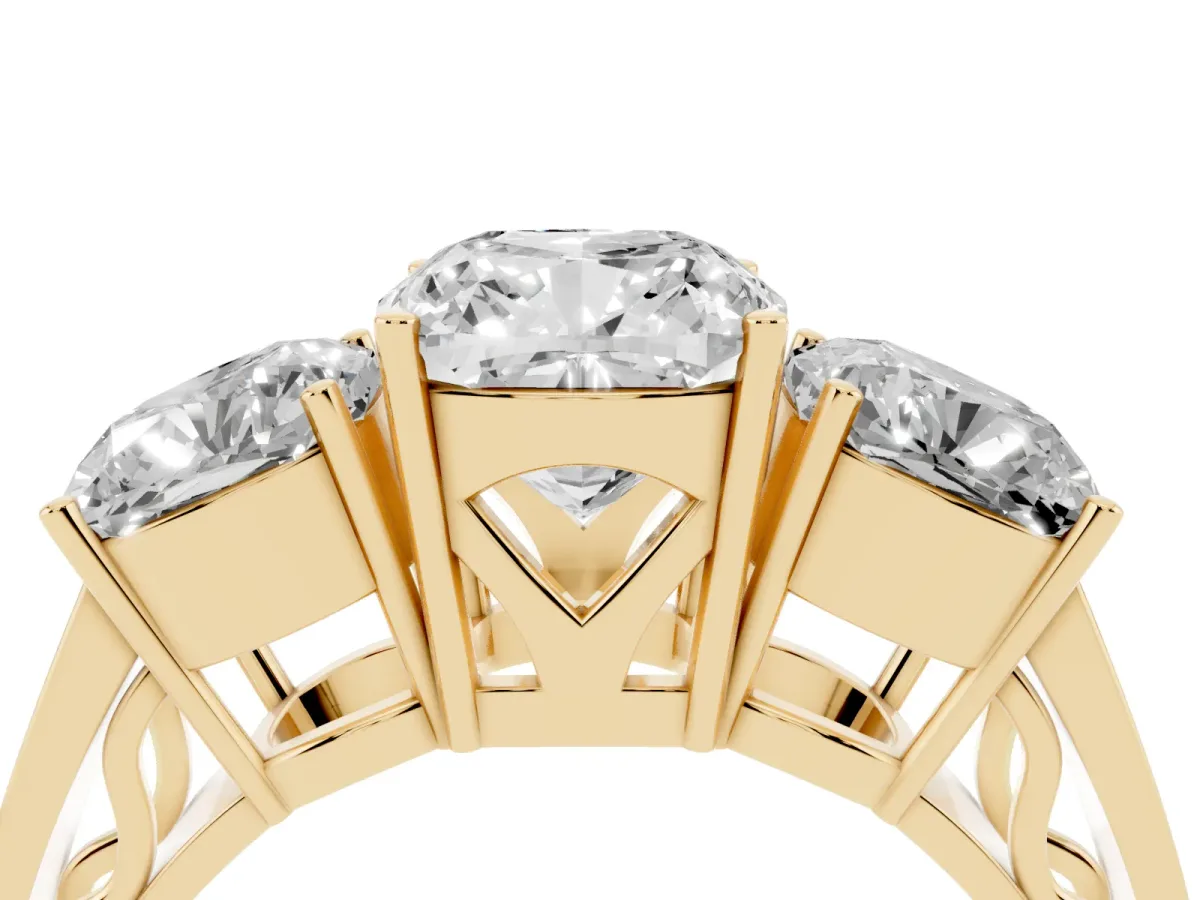Cushion Cut Diamond Three-Stone Ring with Prong Setting and Textured Band Yellow gold