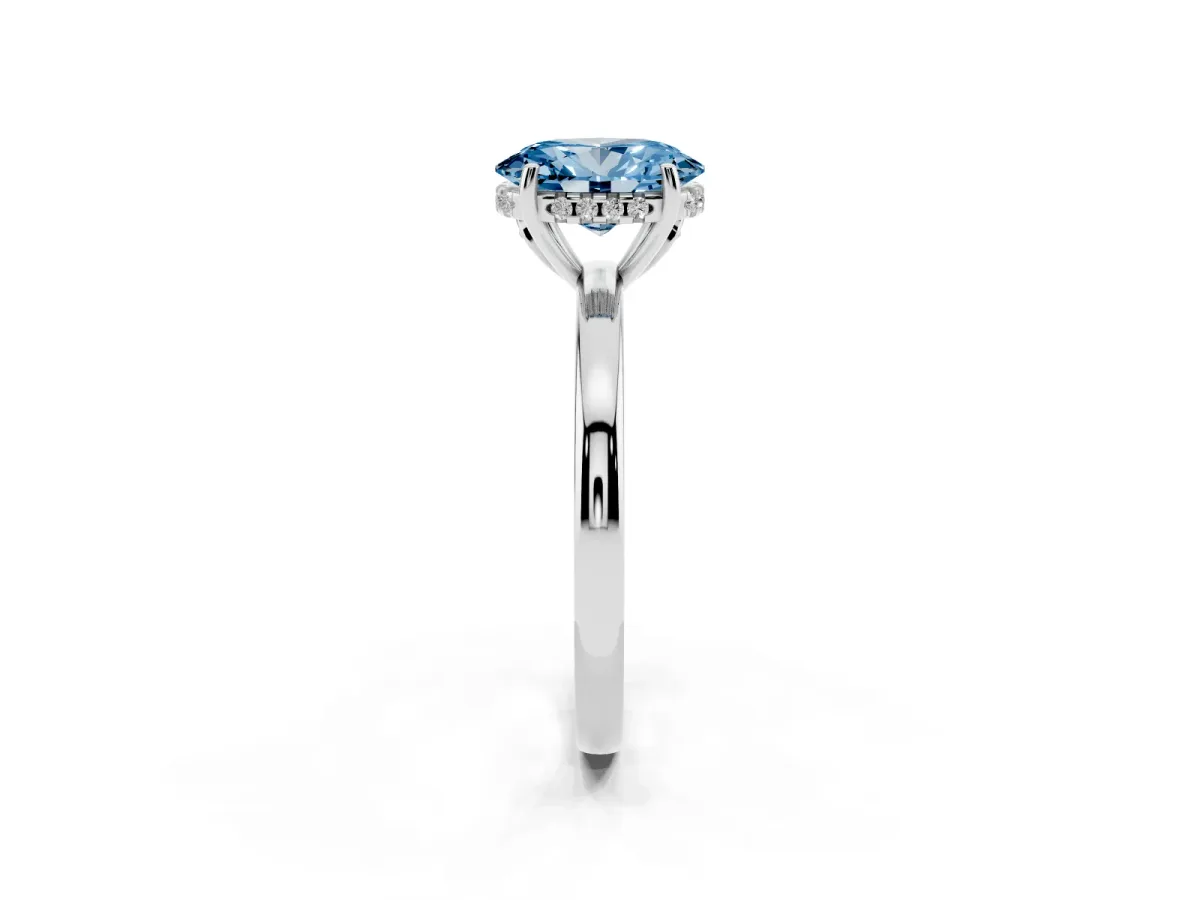 Fancy Blue Oval Cut Solitaire Diamond Ring with Prong Setting and Plain Band Platinum