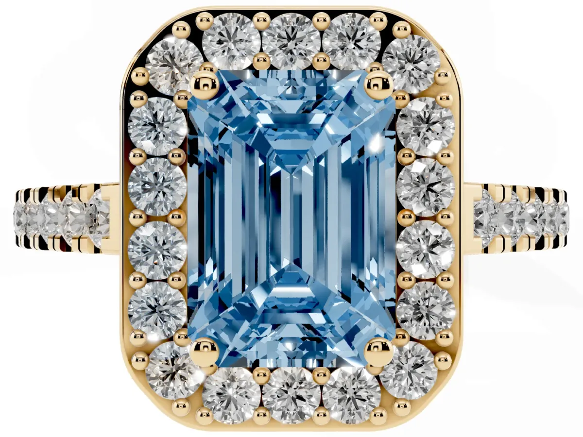 Fancy Blue Emerald Cut Diamond Halo Ring with Round Pavé Split Shank and Prong Setting Yellow gold