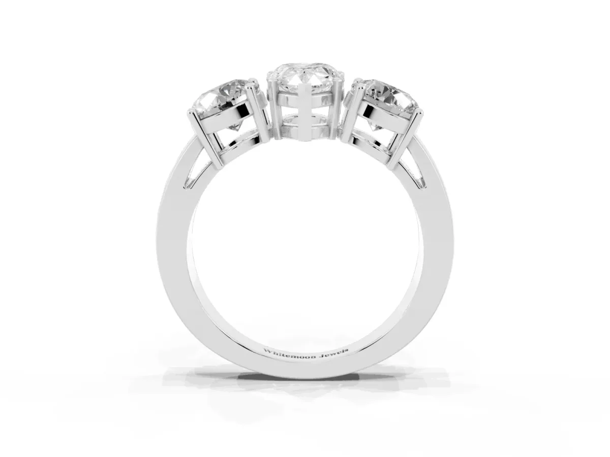 Three-Stone Pear Cut Diamond Ring with Round Side Stones, Classic Band, and Four-Prong Setting Platinum
