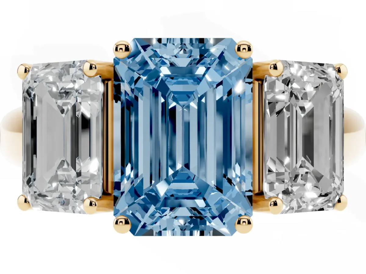 Fancy Blue Three-Stone Emerald Cut Diamond Engagement Ring with Prong Setting Yellow gold