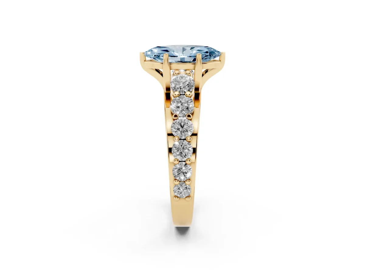 Fancy Blue Marquise Cut Diamond Engagement Ring with Pavé Band and Four-Prong Setting Yellow gold
