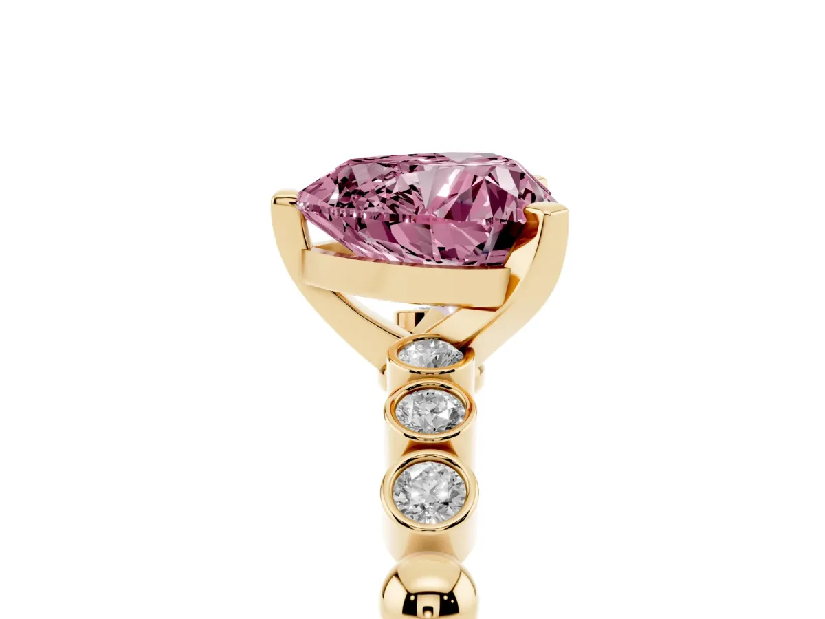 Fancy Pink Heart Cut Solitaire Bezel Accent Diamond Engagement Ring with Beaded Band and Four-Prong Setting Yellow gold