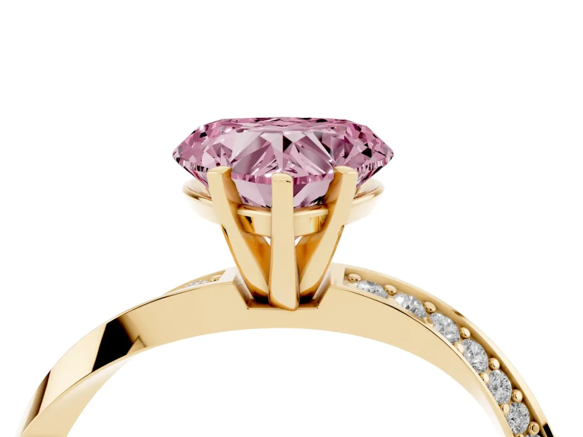 Fancy Pink Heart Cut Diamond Engagement Ring with Side Stone Accents and Four-Prong Setting Yellow gold