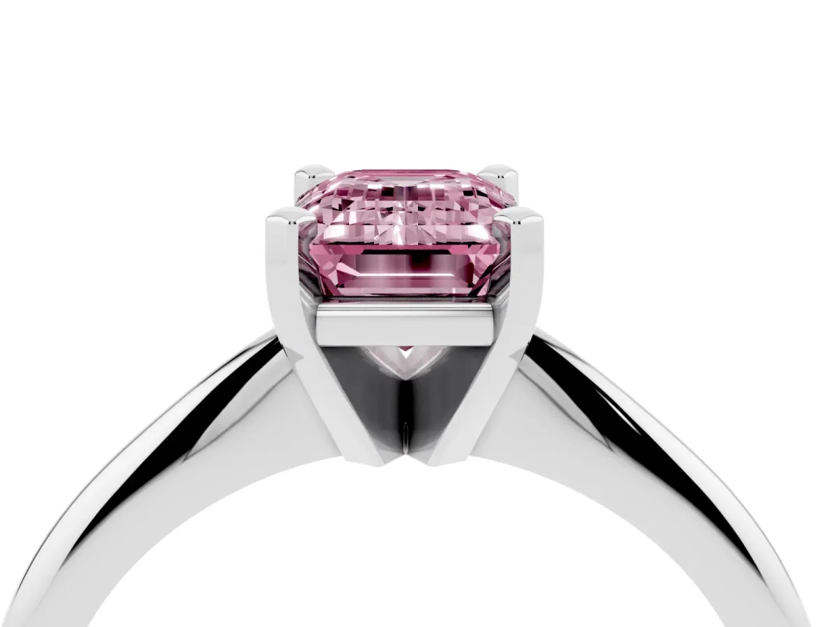 Fancy Pink Emerald Cut Cut Solitaire Ring with Four-Prong Setting on a Classic Band Platinum
