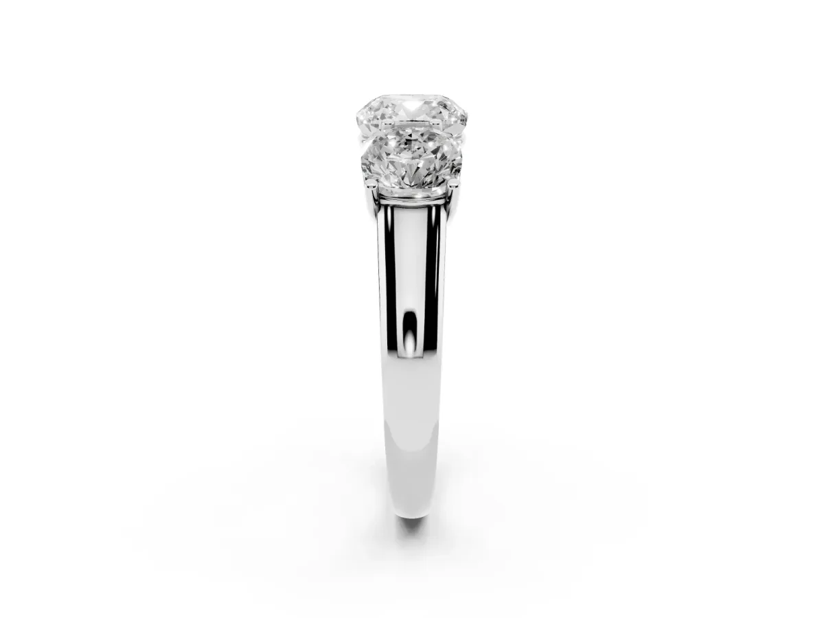 Cushion Cut Three-Stone Diamond Ring with Prong Setting on a Classic Band Silver