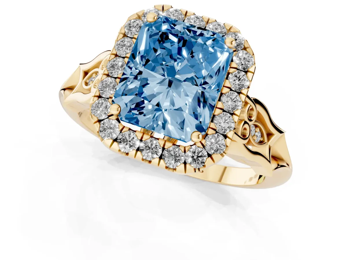 Fancy Blue Radiant Cut Halo Diamond Engagement Ring with Filigree Band and Four-Prong Setting Yellow gold