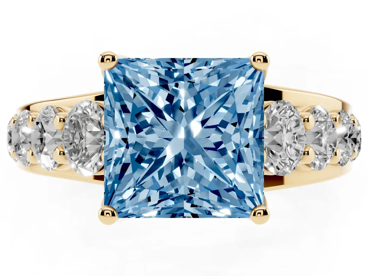 Fancy Blue Princess Cut Diamond Engagement Ring with Pavé Band and Four-Prong Setting Yellow gold