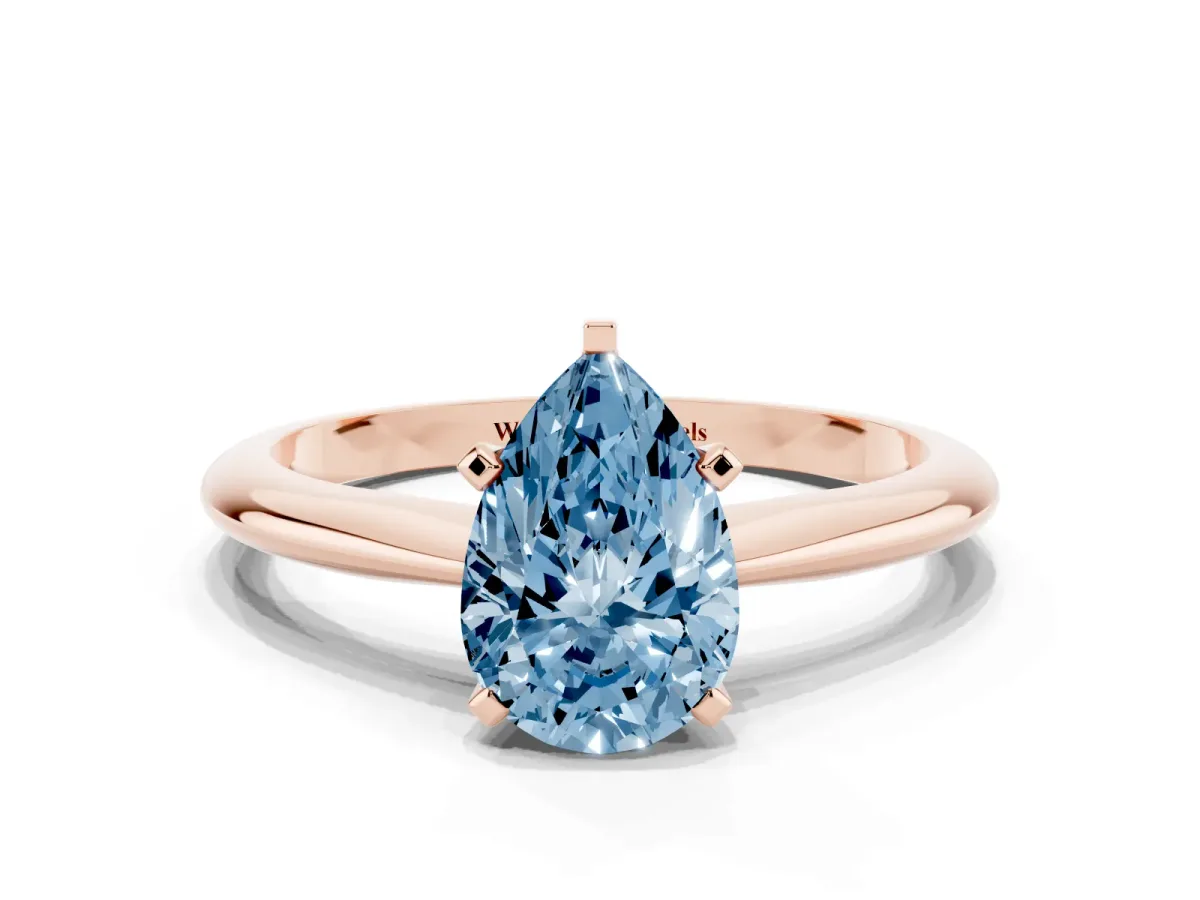 Fancy Blue Pear Cut Cut Solitaire Ring with Four-Prong Setting on a Classic Band Rose gold