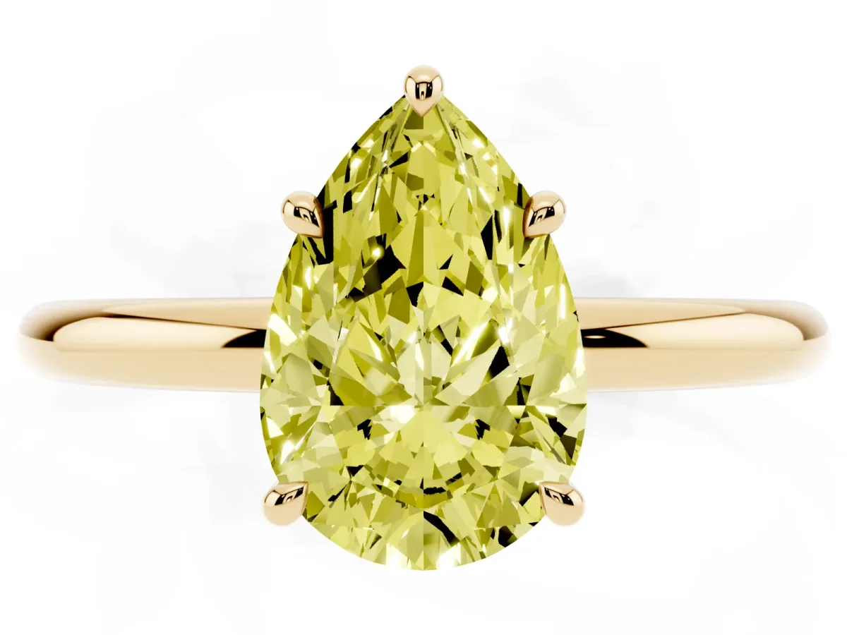 Fancy Yellow Pear Cut Diamond Solitaire Ring with Thin Band and Four-Prong Setting Yellow gold