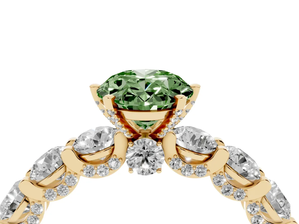 Fancy Green Oval Cut Diamond Side Stone Engagement Ring with Four-Prong Setting Yellow gold
