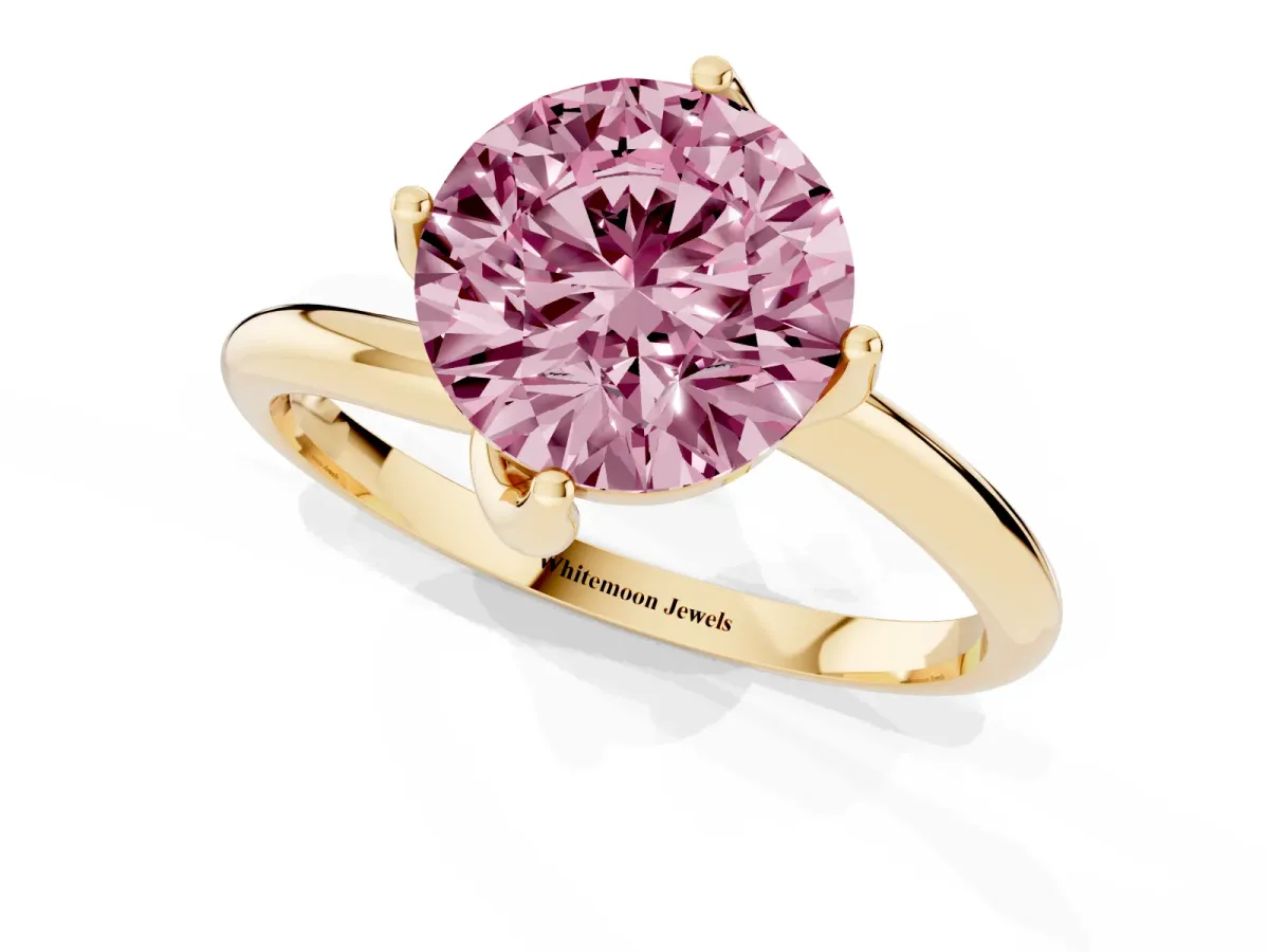Fancy Pink Round Cut Diamond Solitaire Engagement Ring with Four-Prong Setting and Classic Band Yellow gold