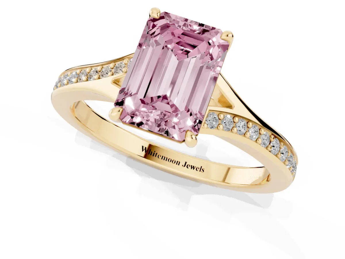 Fancy Pink Emerald Cut Diamond Solitaire Ring with Pavé Band and Prong Setting Yellow gold
