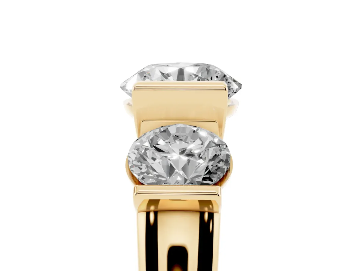 Three-Stone Round Cut Brilliant Diamond Ring with Channel Setting and White Gold Band Yellow gold