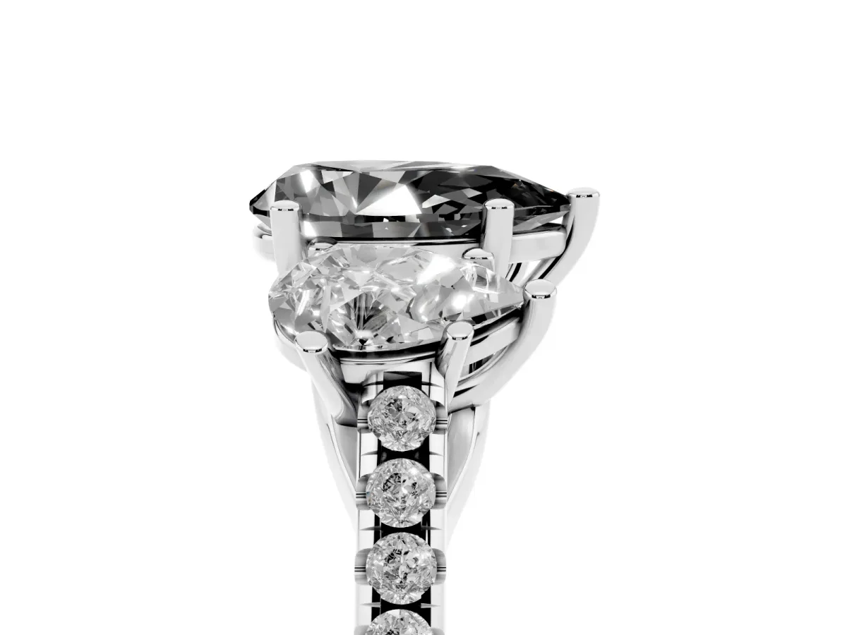 Fancy Black Three-Stone Pear Cut Diamond Ring with Round Pavé Band and Prong Setting Silver