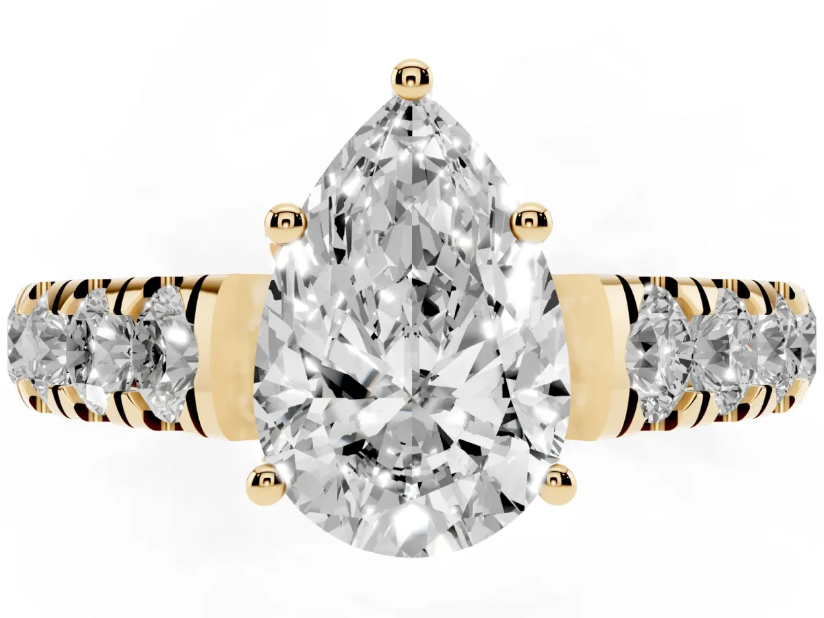 Pear Cut Cut Diamond Solitaire Ring with Micro Pave Band and Prong Setting Yellow gold