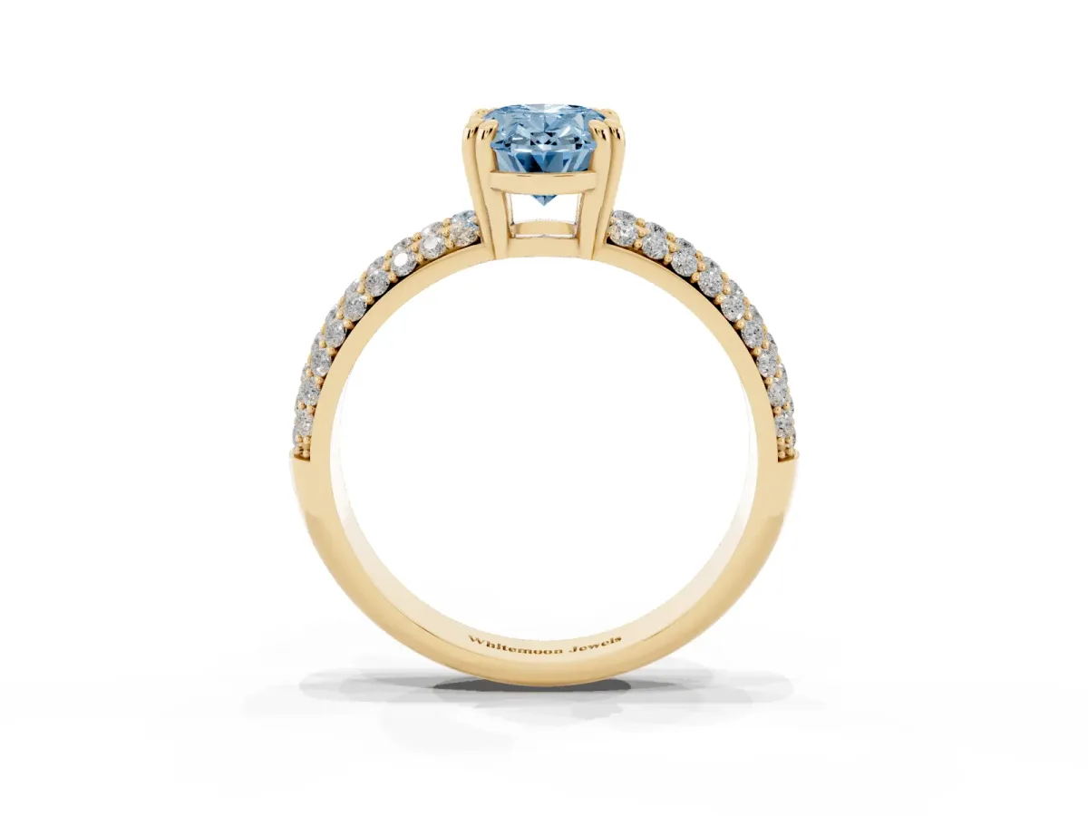 Fancy Blue Oval Cut Diamond Solitaire Ring with Multi-Row Round Pavé Band and Prong Setting Yellow gold