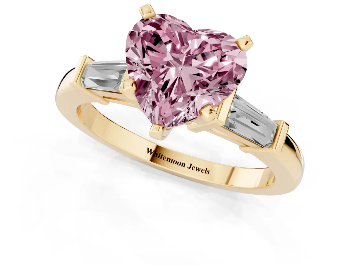 Fancy Pink Heart Cut Cut Diamond Solitaire Ring with Tapered Baguette Accents and Four-Prong Setting Yellow gold